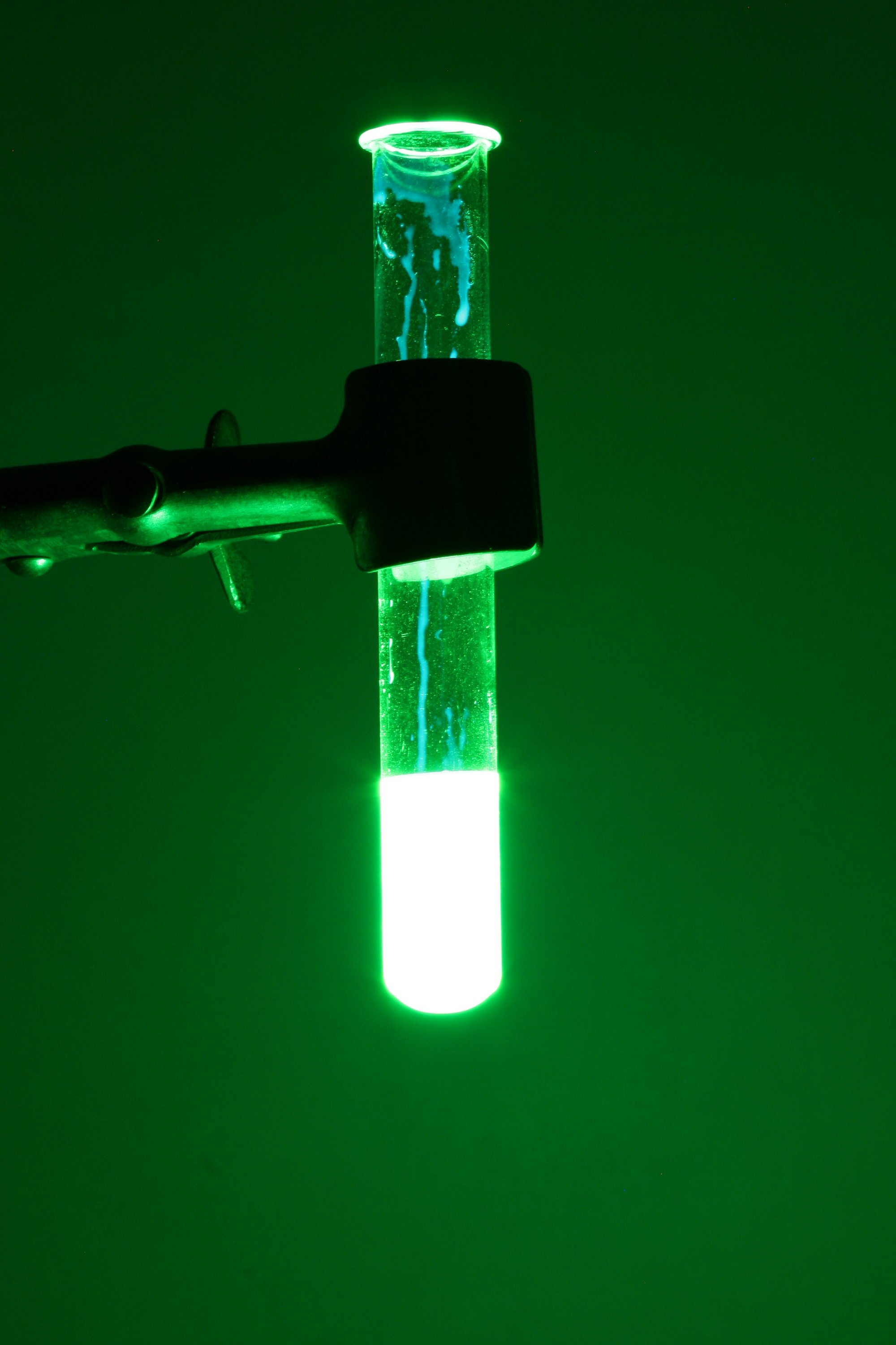 Green glowing test tube Creative commons licence image by PRHaney
